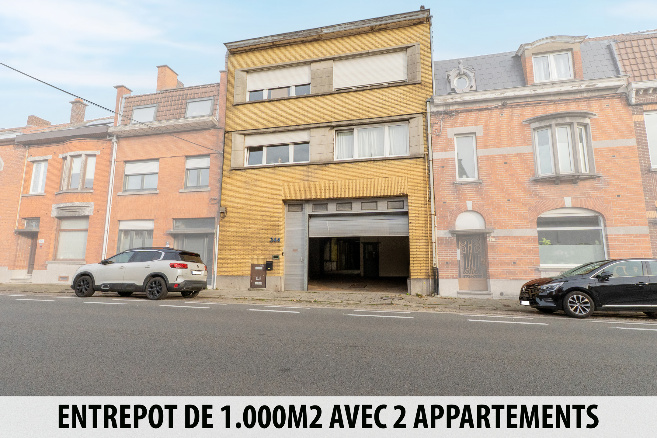 Immeuble avec entrepôt de 1.000M2 et 2 appartements !