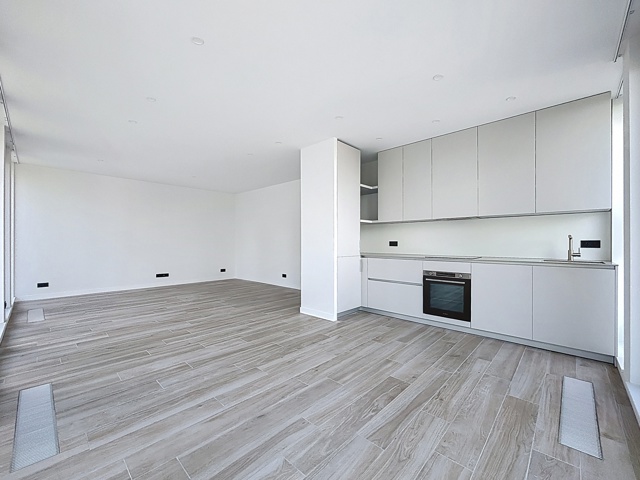 Appartement neuf une chambre avec terrasse, parking et cave. Libre le 1er octobre 2026.