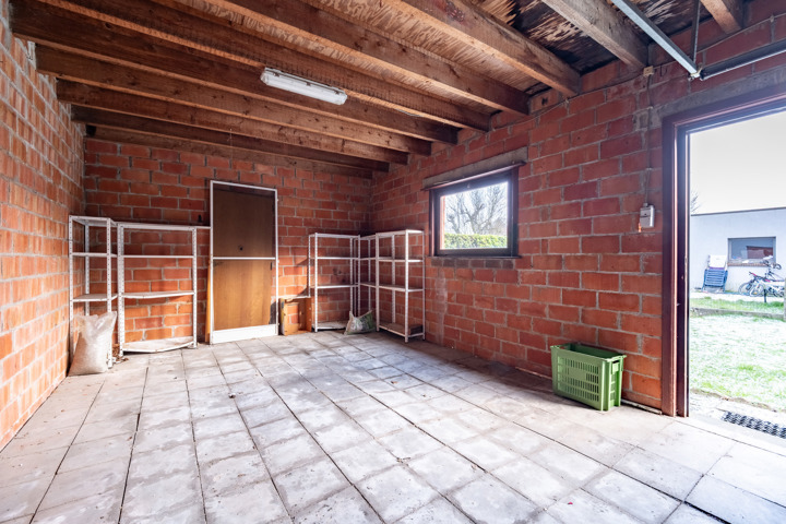 Goed gelegen, halfopen woning met garage en tuin