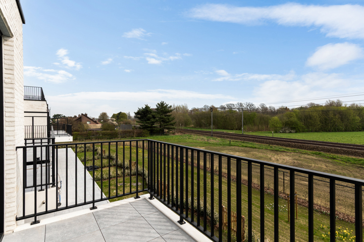 Knap nieuwbouwappartement met garagebox