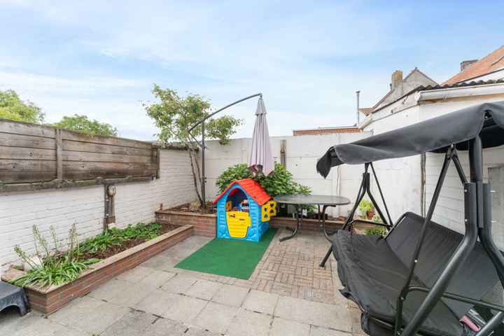 Centraal gelegen woning met afzonderlijke garage