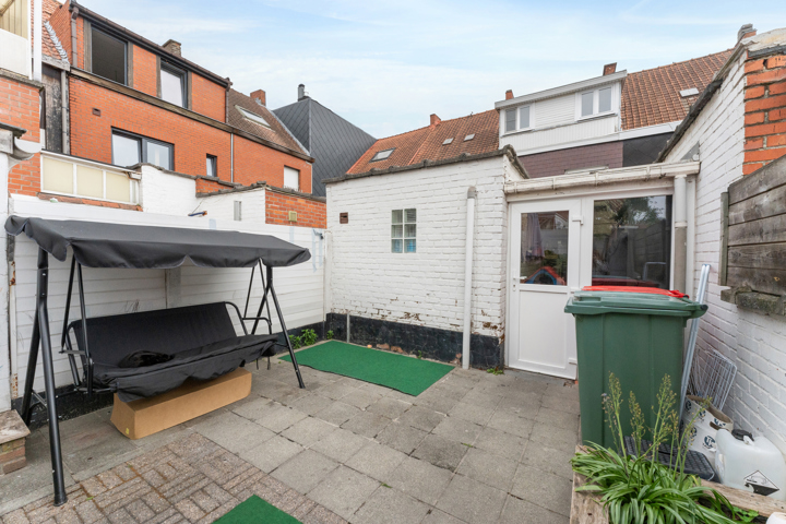 Centraal gelegen woning met afzonderlijke garage