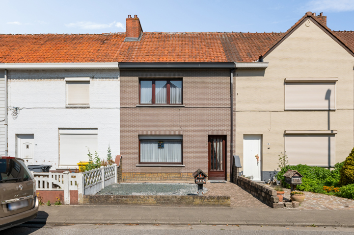 Stadswoning met wegenis.