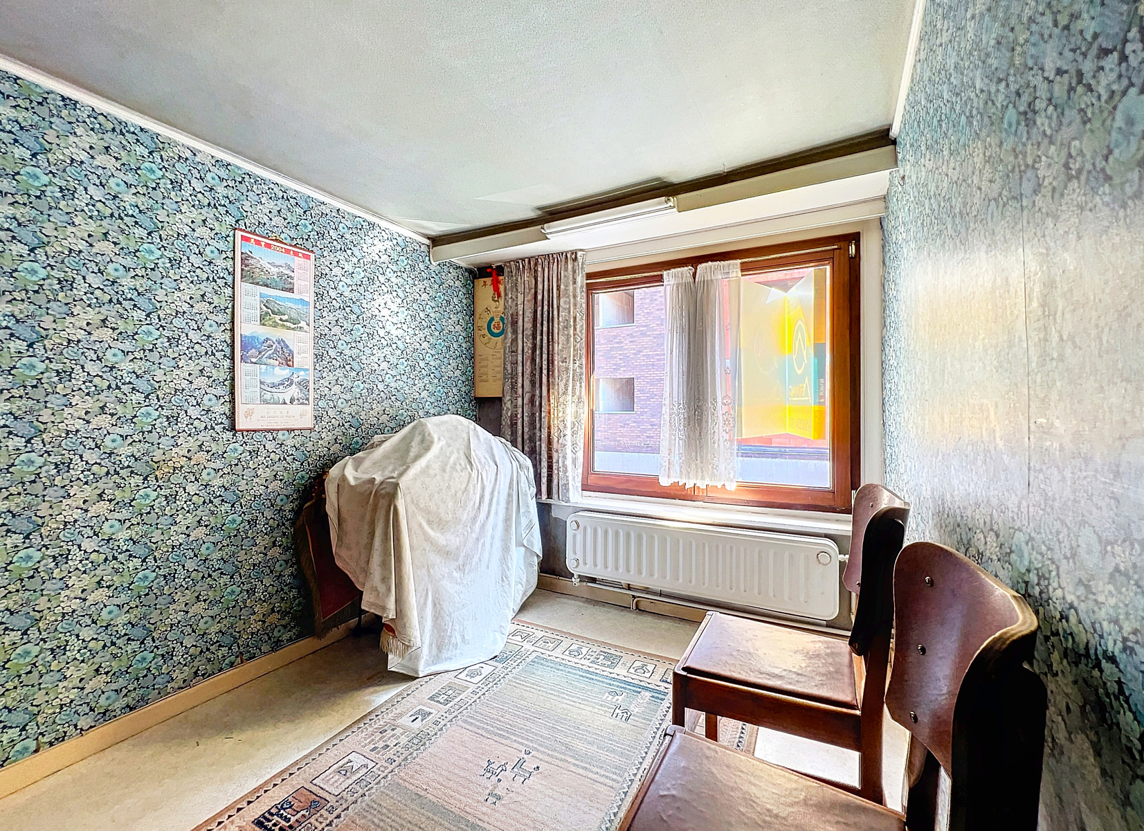 Charmante maison mitoyenne située dans un quartier calme 