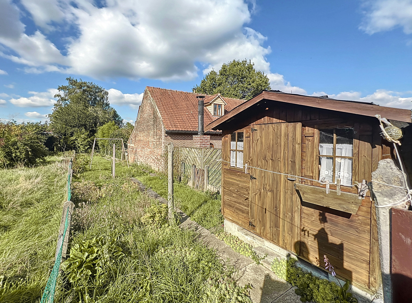 Charmante maison mitoyenne située dans un quartier calme 