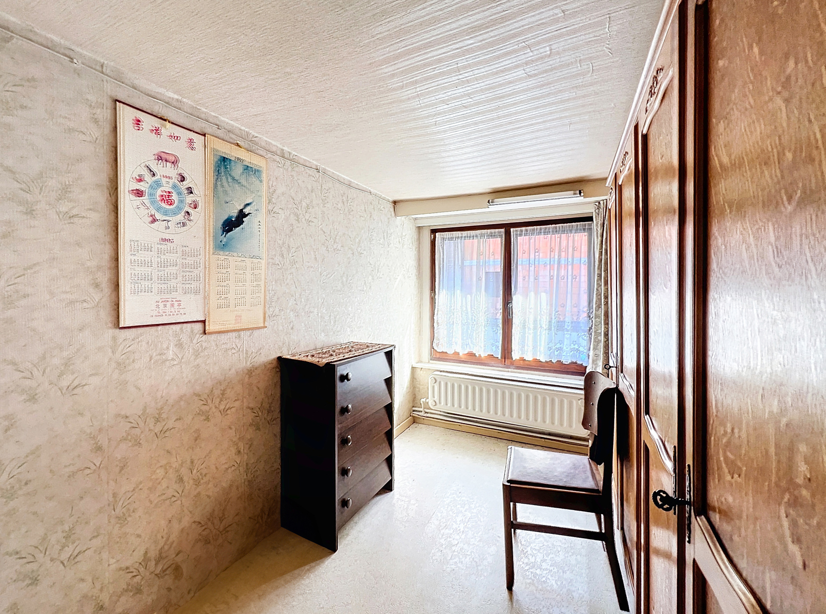 Charmante maison mitoyenne située dans un quartier calme 