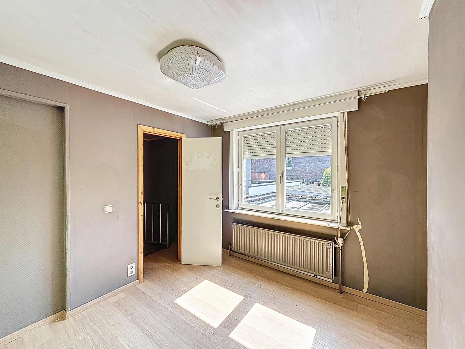 Maison à rénover située à Mouscron avec jardin 