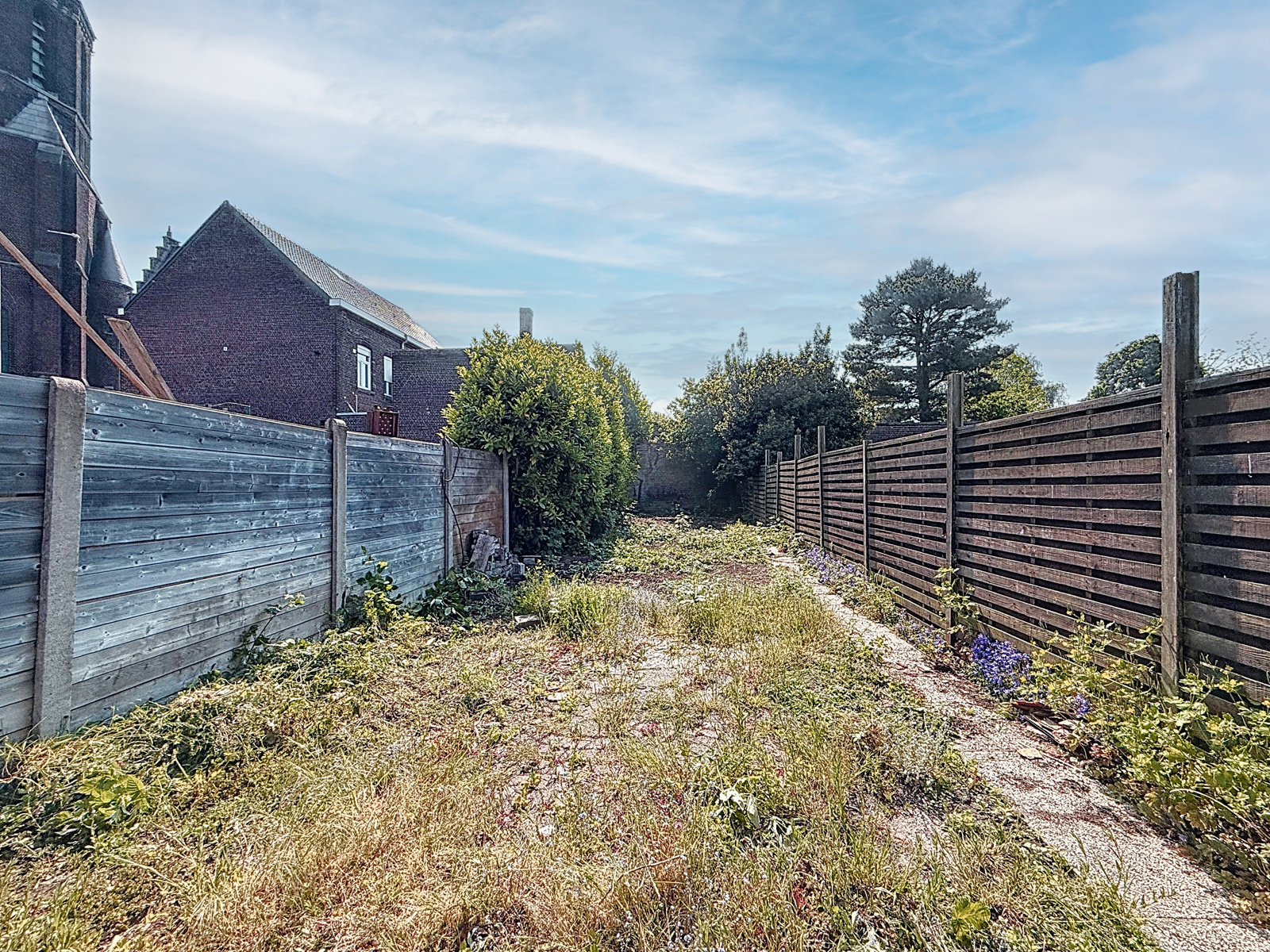 Maison à rénover située à Mouscron avec jardin 