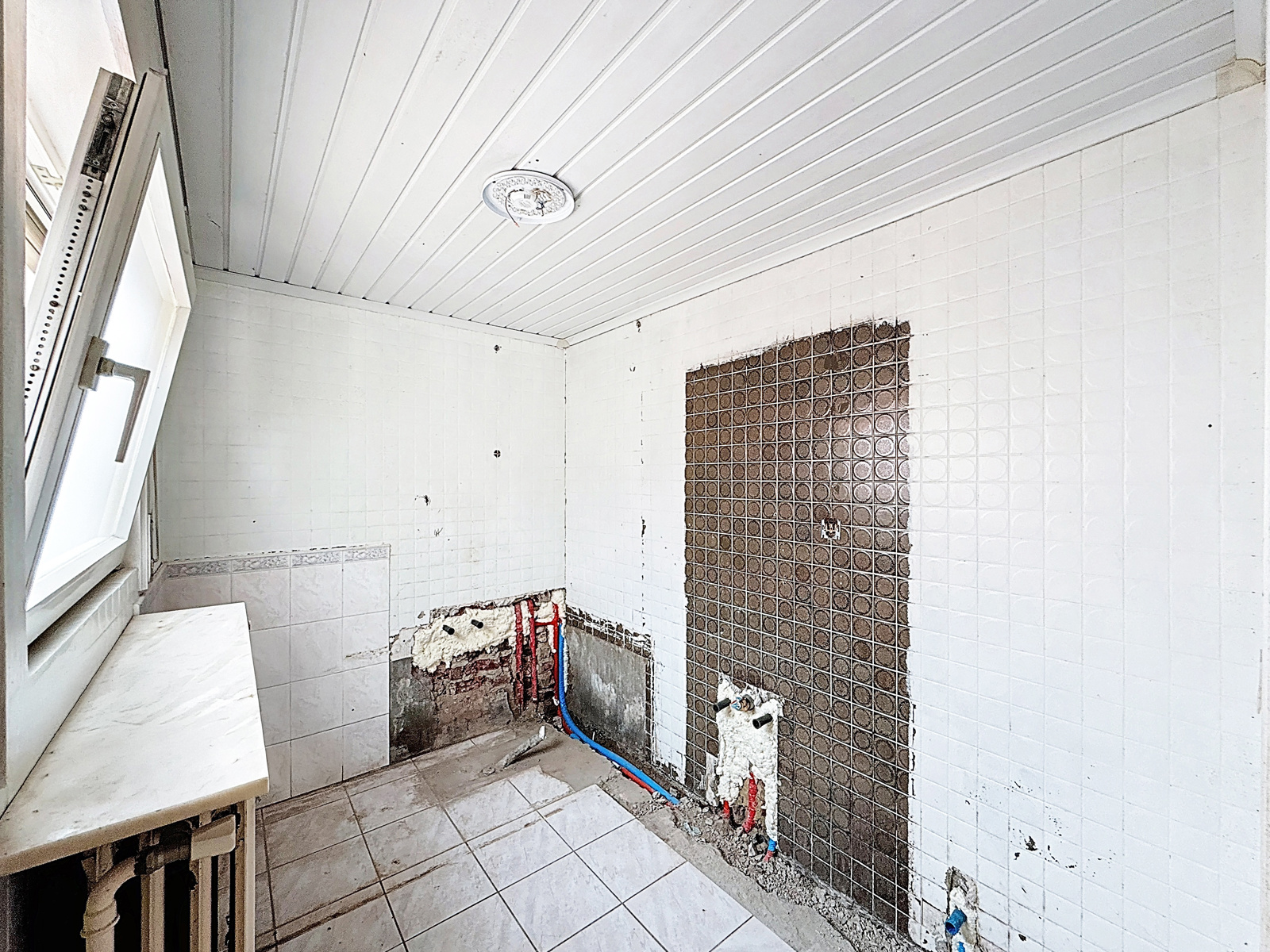 Maison à rénover située à Mouscron avec jardin 