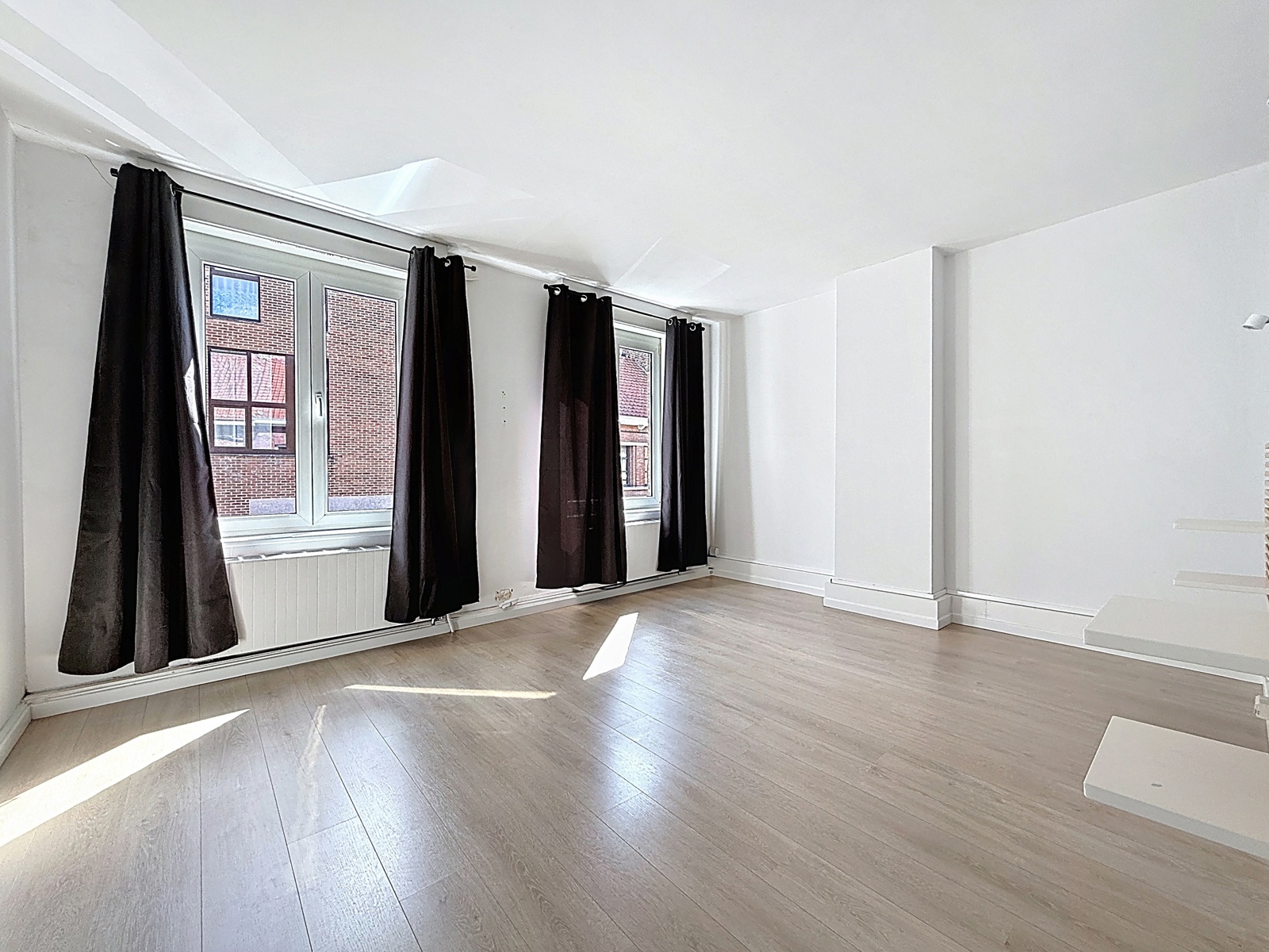 Maison 2 chambres avec jardin en plein centre-ville