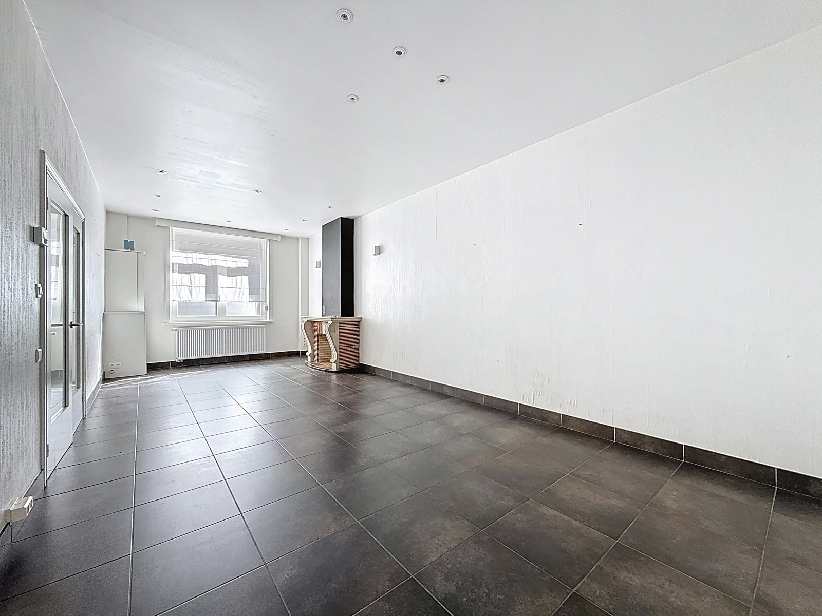 Maison 2 chambres avec jardin en plein centre-ville