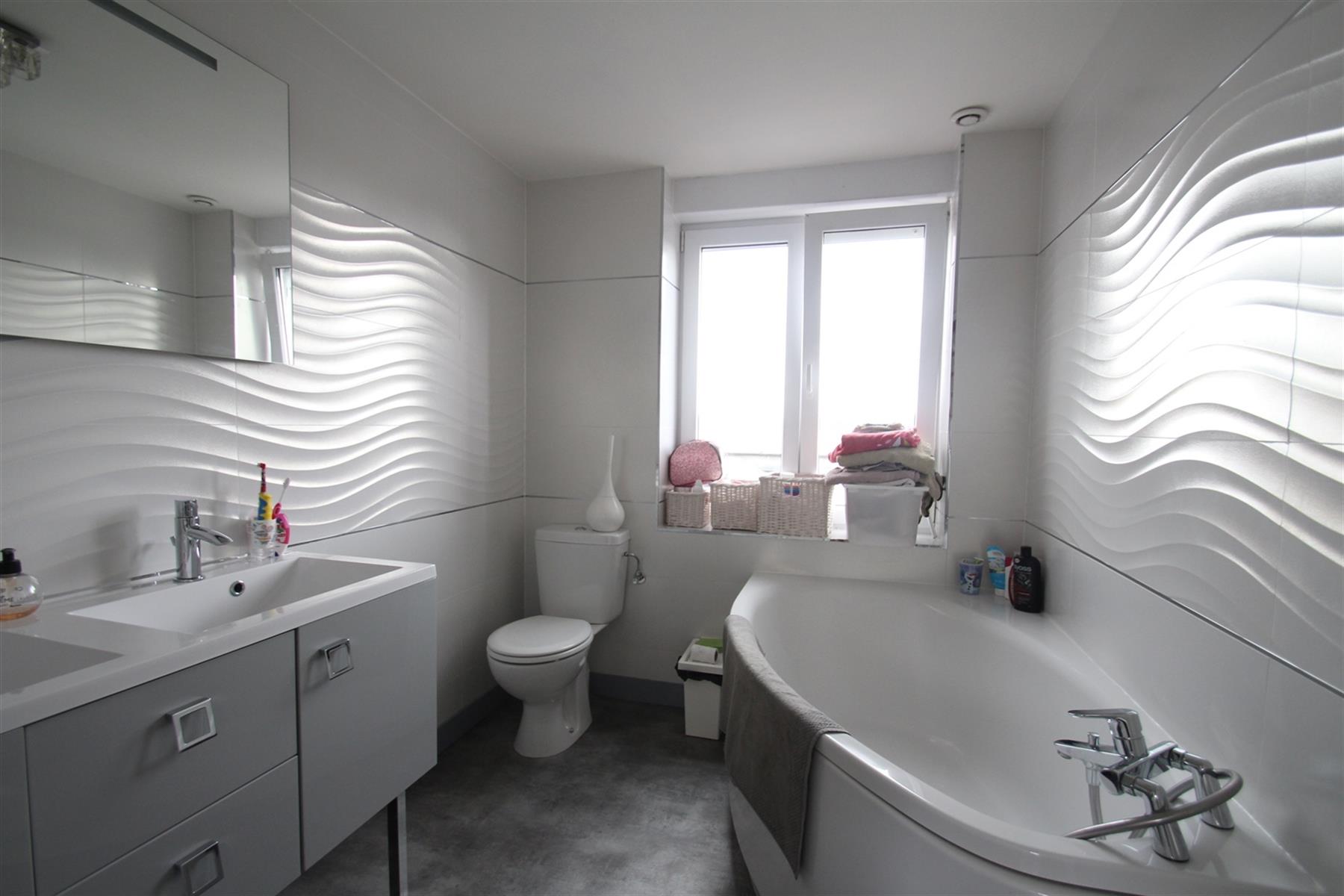 Maison mitoyenne avec 3 chambres et jardin à Leers-Nord