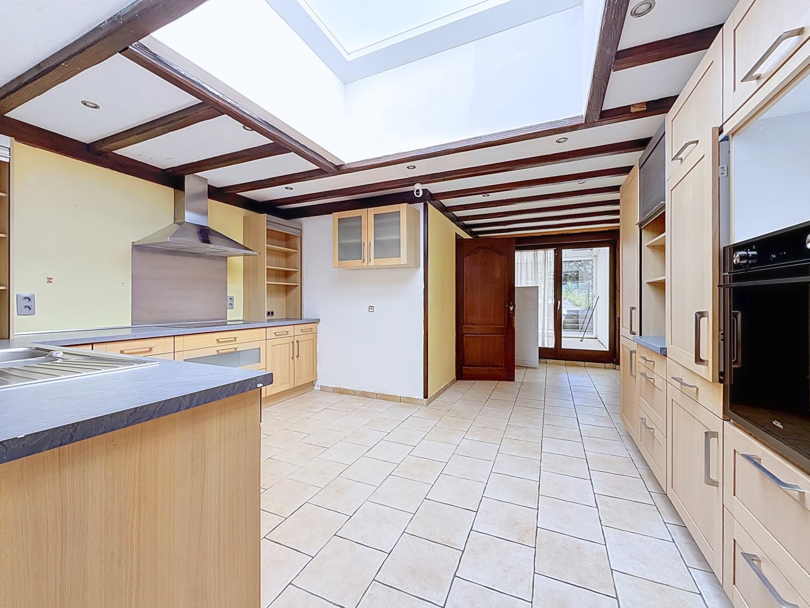 Maison mitoyenne 4 chambres avec jardin proche du Parc