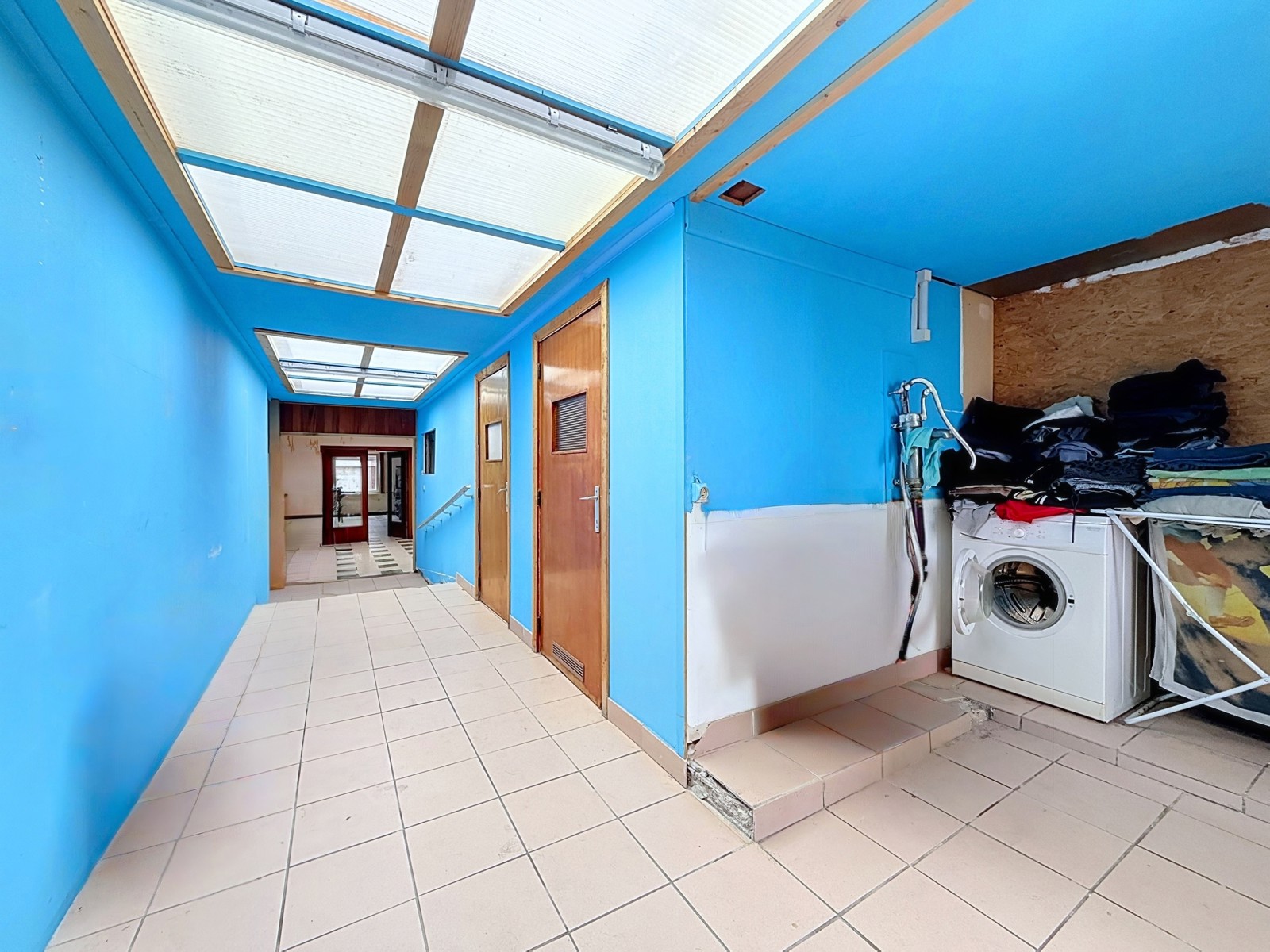 Habitation avec beau potentiel et garage proche de Luingne