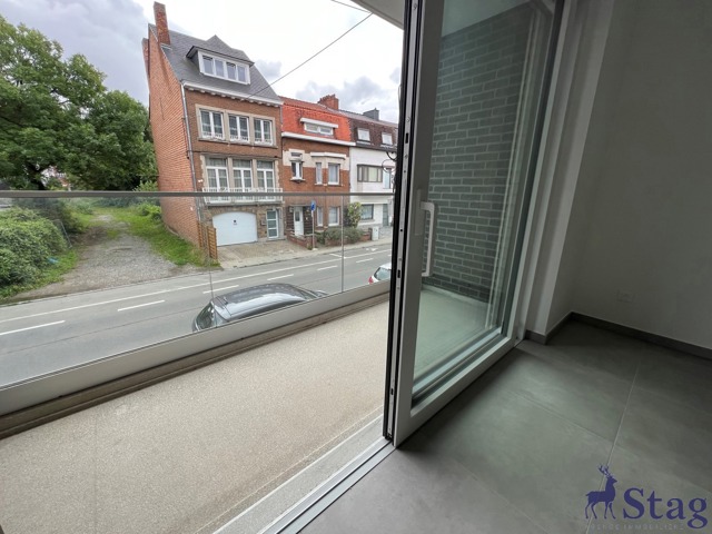 Appartement 2 chambres, terrasse, parking et cave