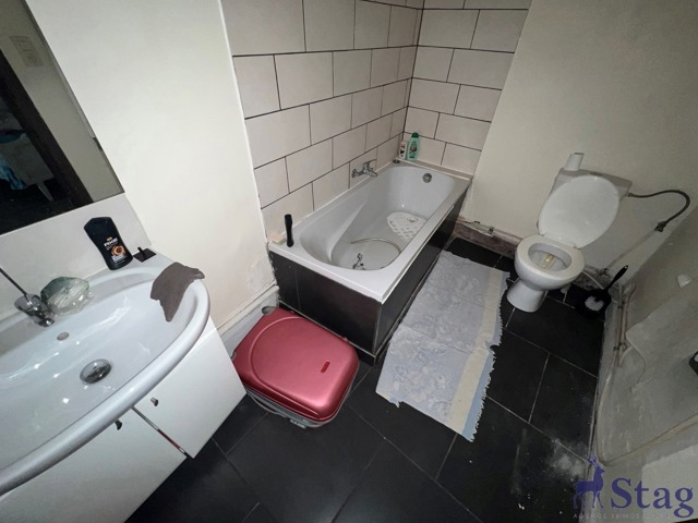 Immeuble mixte à grand potentiel - 2 logements et 1 commerce