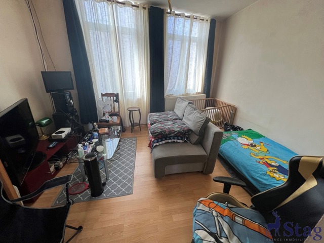 Immeuble mixte à grand potentiel - 2 logements et 1 commerce