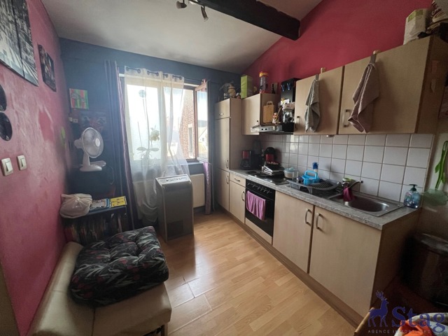 Immeuble mixte à grand potentiel - 2 logements et 1 commerce