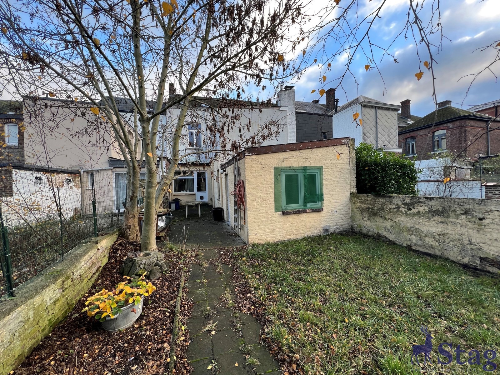 Maison 5 chambres, jardin et caves idéalement située