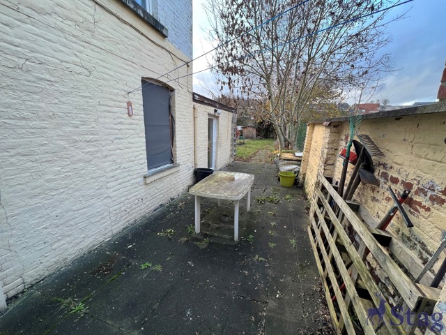 Maison 5 chambres, jardin et caves  idéalement située