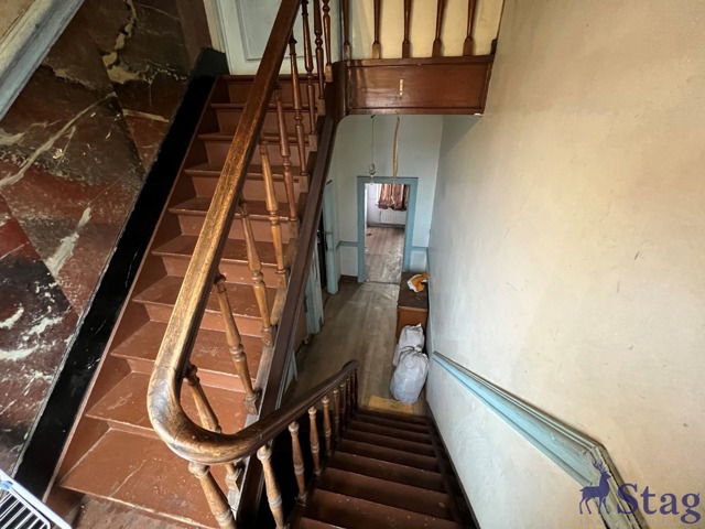 Maison 5 chambres, jardin et caves  idéalement située