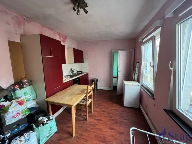 Maison 5 chambres, jardin et caves  idéalement située