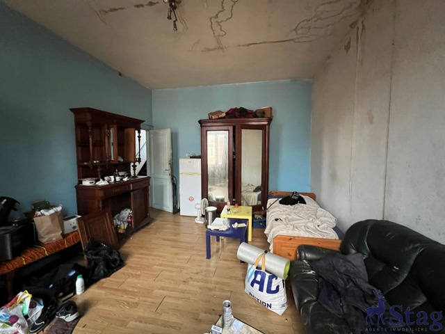 Maison 5 chambres, jardin et caves  idéalement située