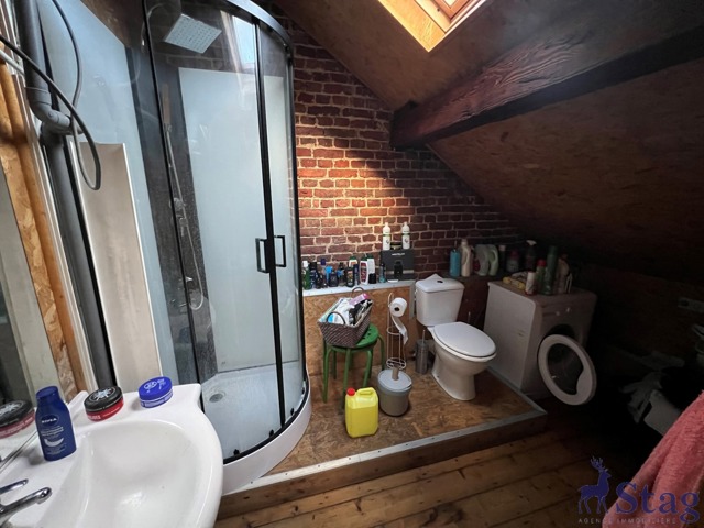 Maison 5 chambres, jardin et caves  idéalement située