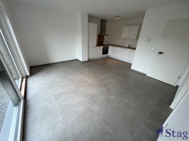 Appartement 2 chambres avec jardin, parking et cave