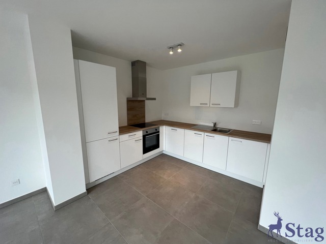 Appartement 2 chambres avec jardin, parking et cave