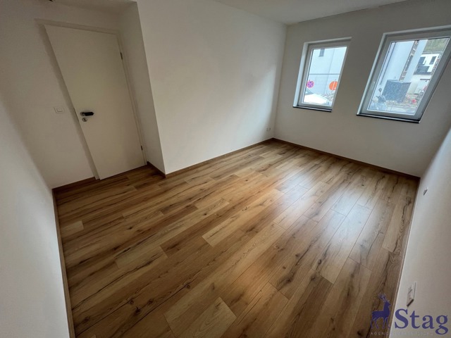 Appartement 2 chambres avec jardin, parking et cave
