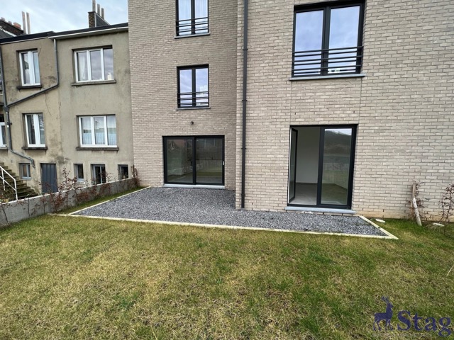 Appartement 2 chambres avec jardin, parking et cave