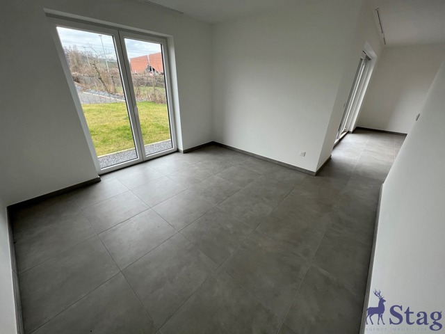 Appartement 2 chambres avec jardin, parking et cave