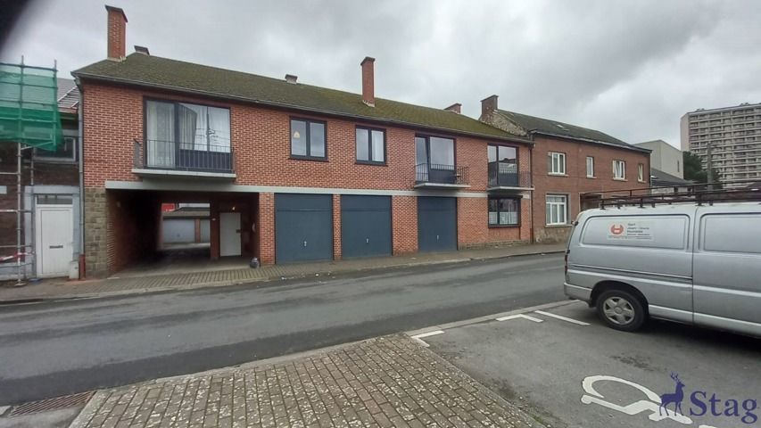 Immeuble comprenant 4 appartements et 10 garages