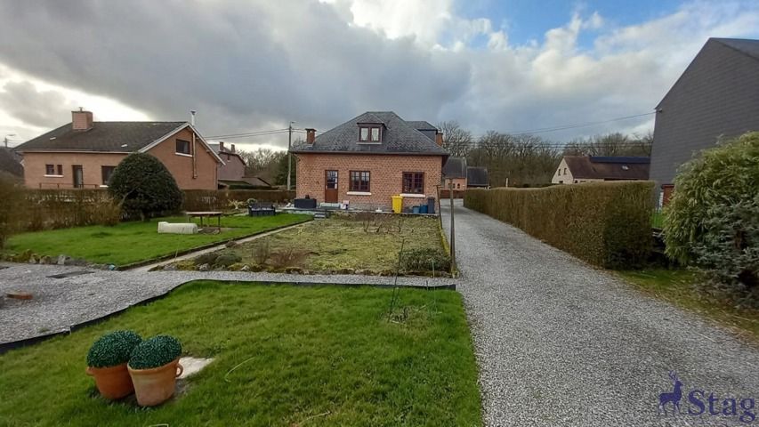 Jolie villa 2 chambres, caves et garage sur terrain de 15a