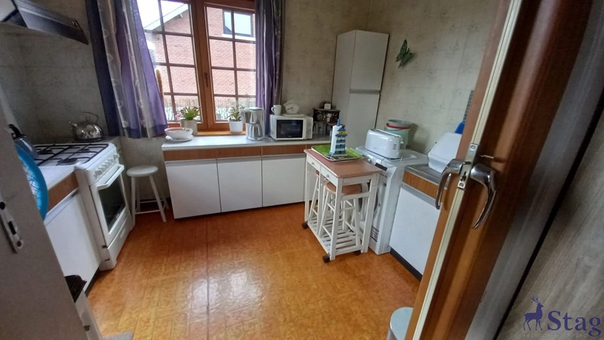 Jolie villa 2 chambres, caves et garage sur terrain de 15a