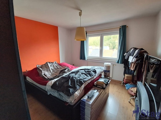 Appartement 2 chambres avec terrasse, parking et cave