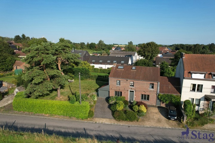 Maison 3 chambres avec beau jardin, cave et garage