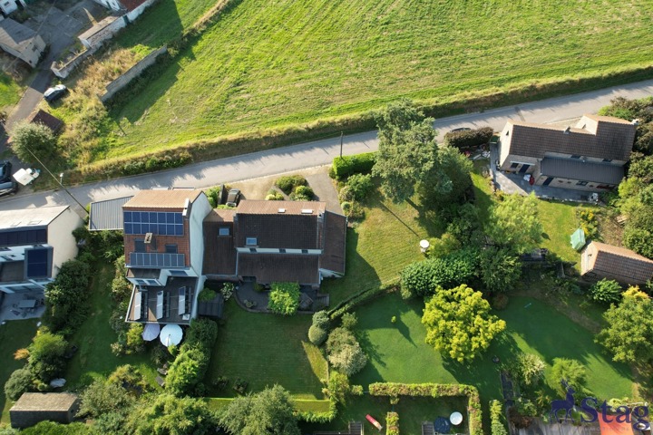 Maison 3 chambres avec beau jardin, cave et garage