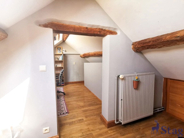 Maison 3 chambres avec beau jardin, cave et garage