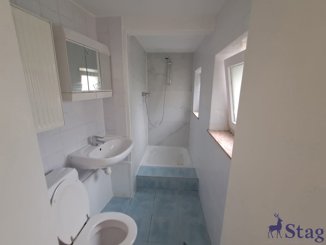 Appartement 1 chambre au rez-de-chaussée avec jardin et cave