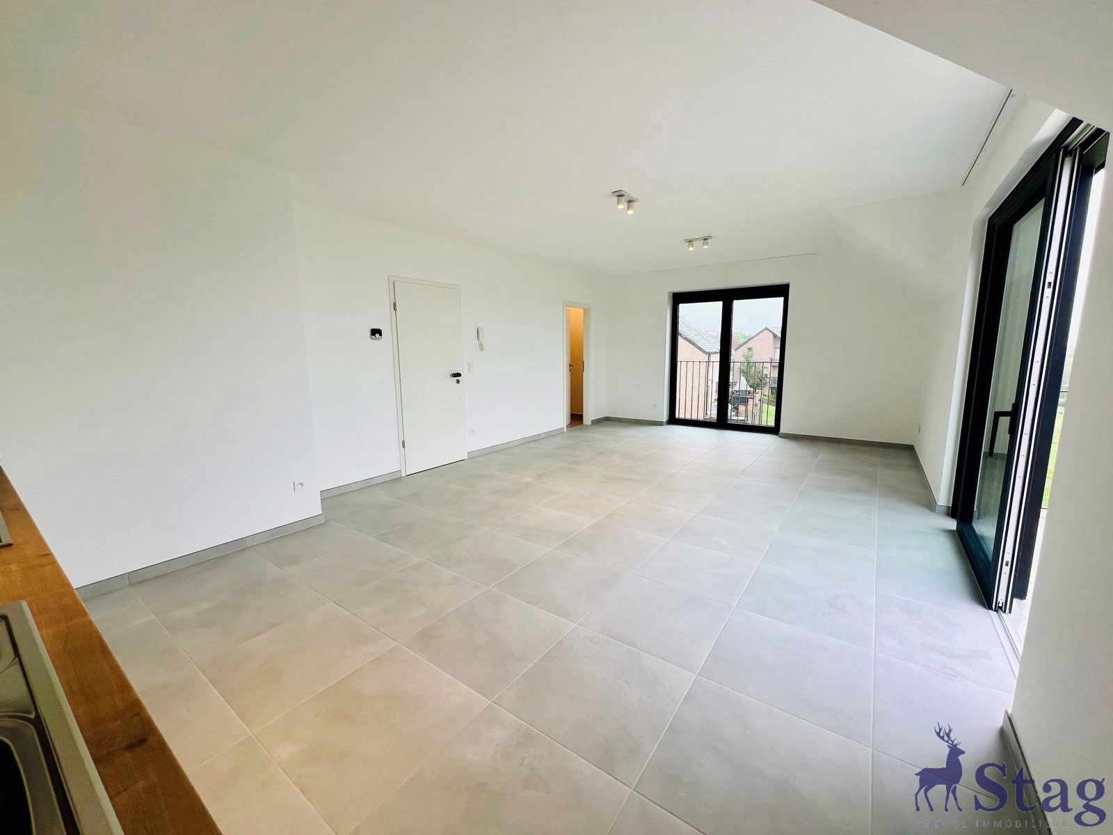 Appartement neuf 2 chambres, terrasse, parking et cave