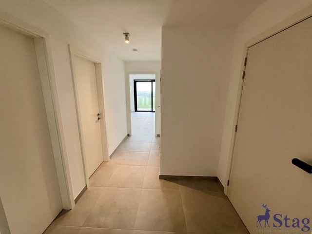 Appartement neuf 2 chambres, terrasse, parking et cave