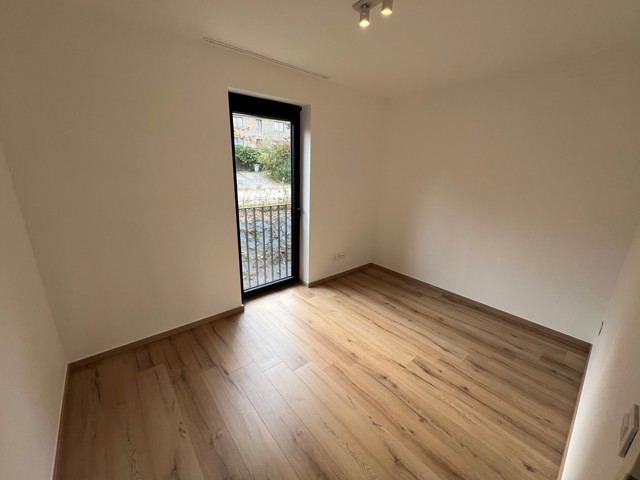 Appartement neuf 2 chambres, terrasse, parking et cave