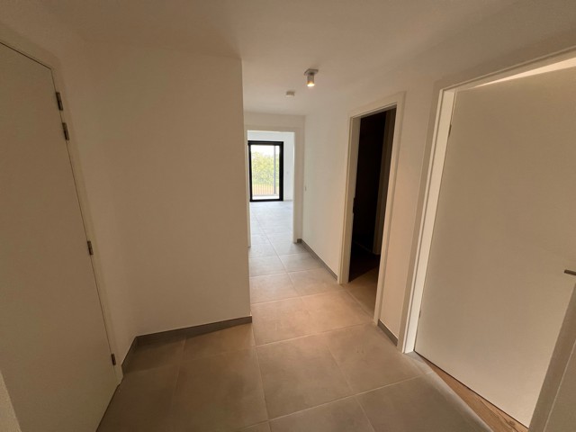 Appartement neuf 2 chambres, terrasse, parking et cave