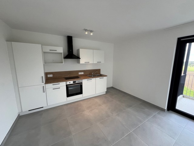 Appartement neuf 2 chambres, terrasse, parking et cave