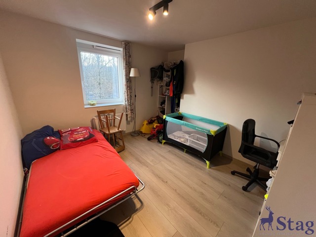 Appartement 2 chambres, terrasse, box garage, parking, cave