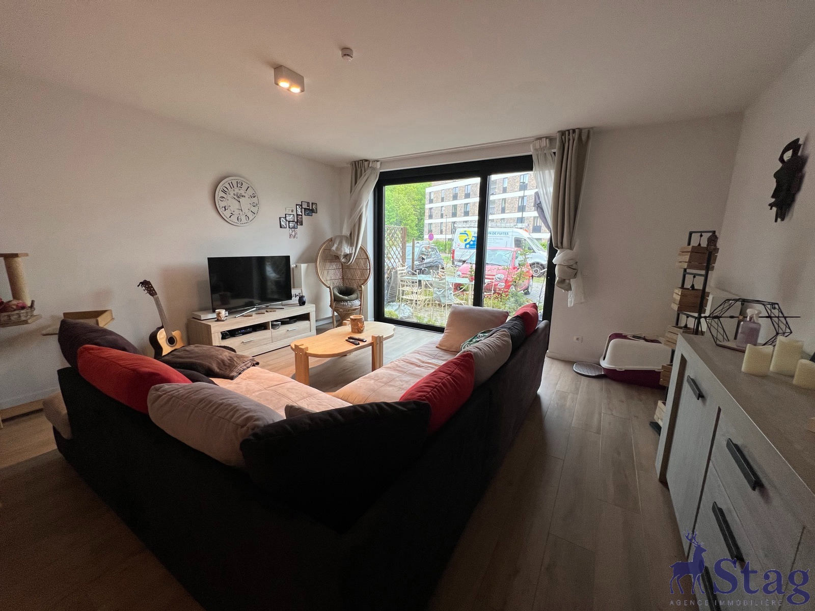 Appartement 1 chambre, rez-de-chaussée, terrasse et parking