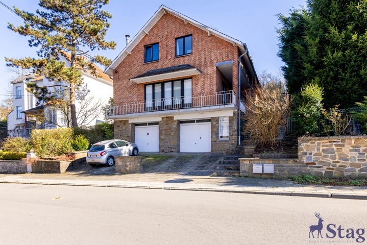 Immeuble de rapport: appt 3ch, 6kots +commun, garages, caves