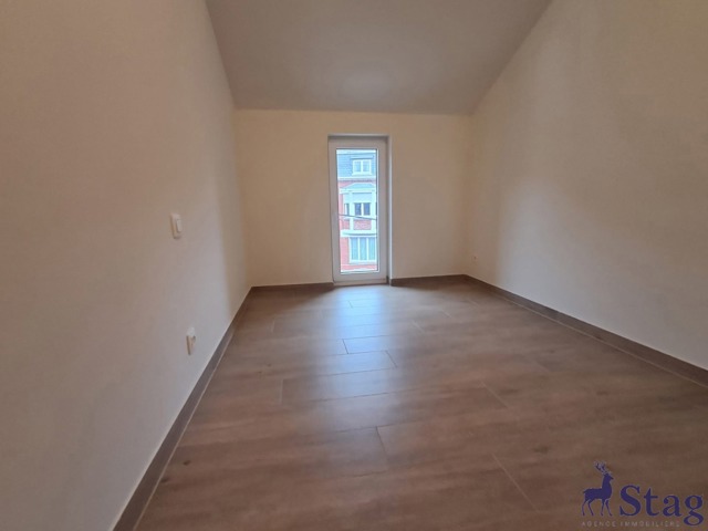 Appartement neuf 2 chambres, terrasse, parking, cave